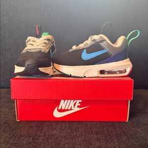 Nike Kids' Black and Blue Sneakers with Green Accents